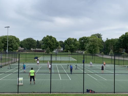 Seniors Playing Tennis